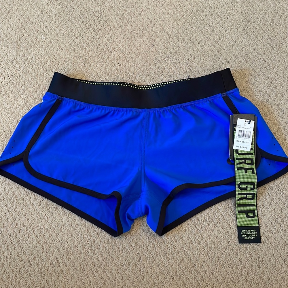 Rip Curl Mirage Ultra Surf Grip 2.5“ Board Shorts women’s size L.